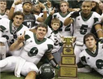 Football team with State Championship Trophy 